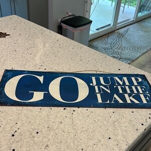 Blue and White Decorative Sign